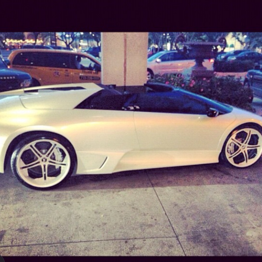 White Lamborghini photographed in an early automotive archive.