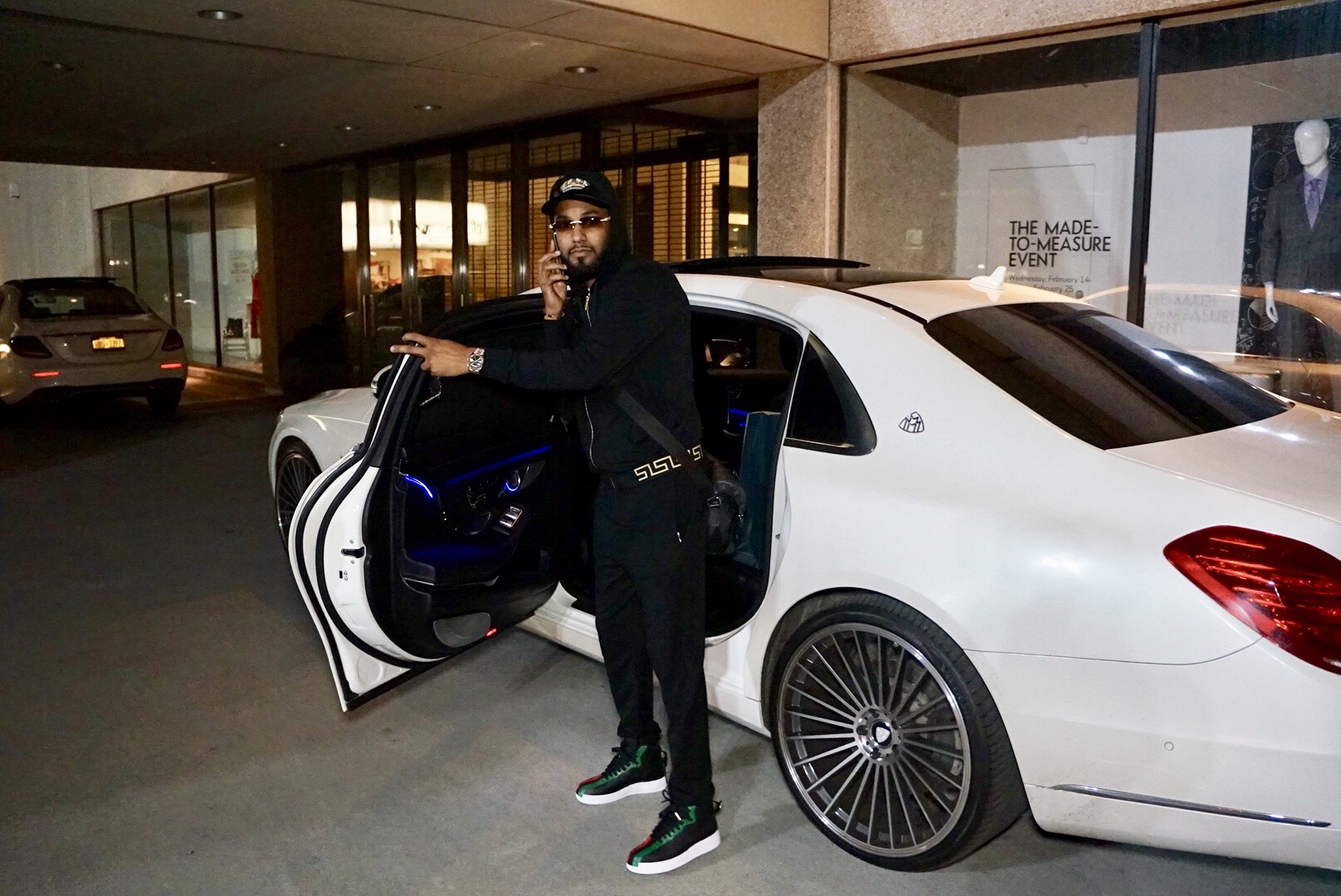 White Mercedes-Maybach with custom wheels.
