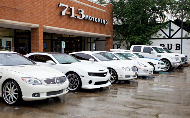 Vehicles outside 713 Motoring, a Houston custom automotive business.