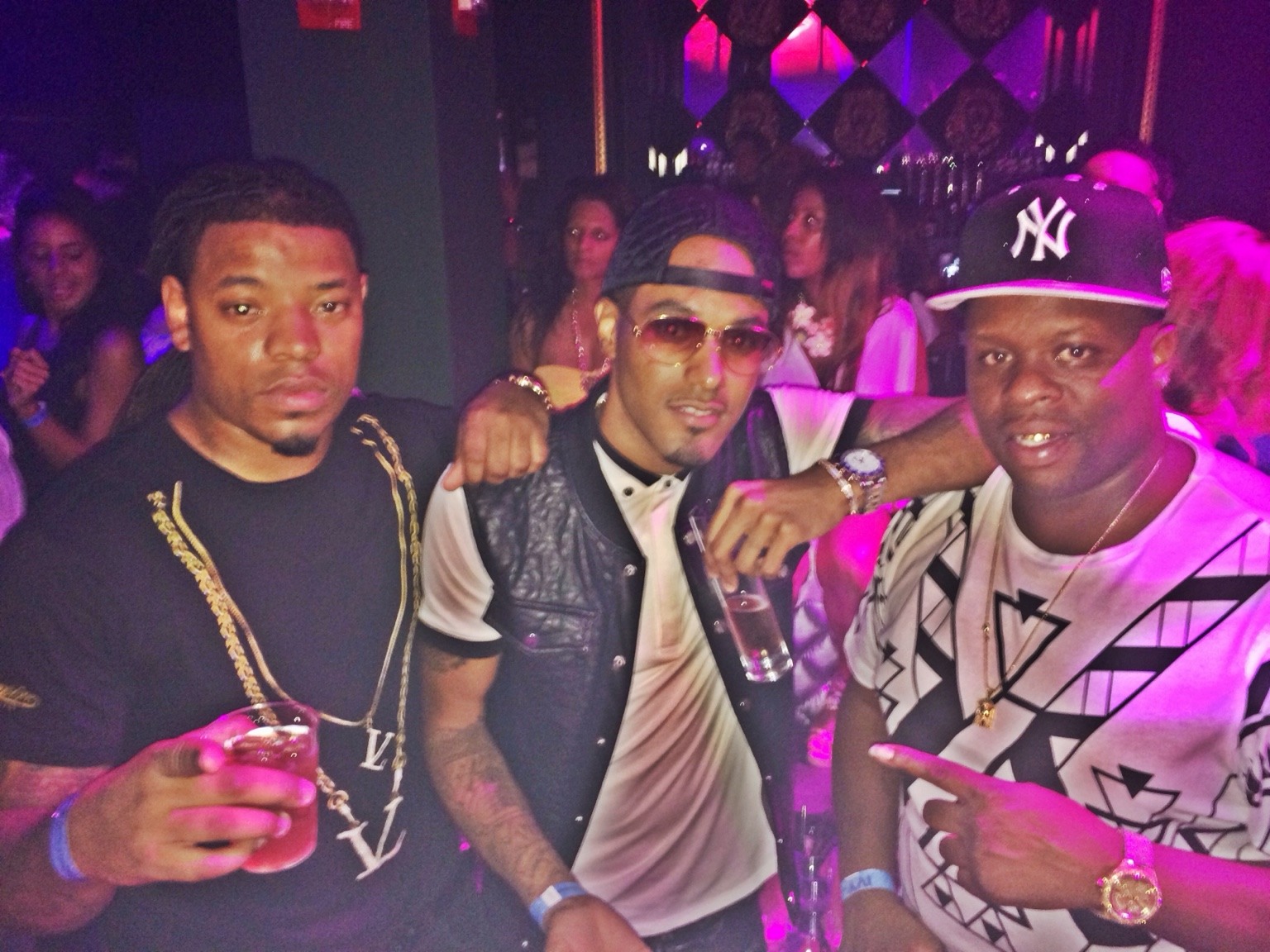 JTrax and music-industry collaborators photographed at a nightlife event