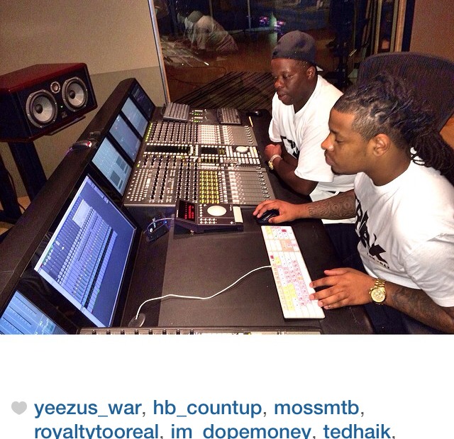 JTrax at a recording studio mixing console with a collaborator — Young Lace and Money To Blow Music Group archival photography