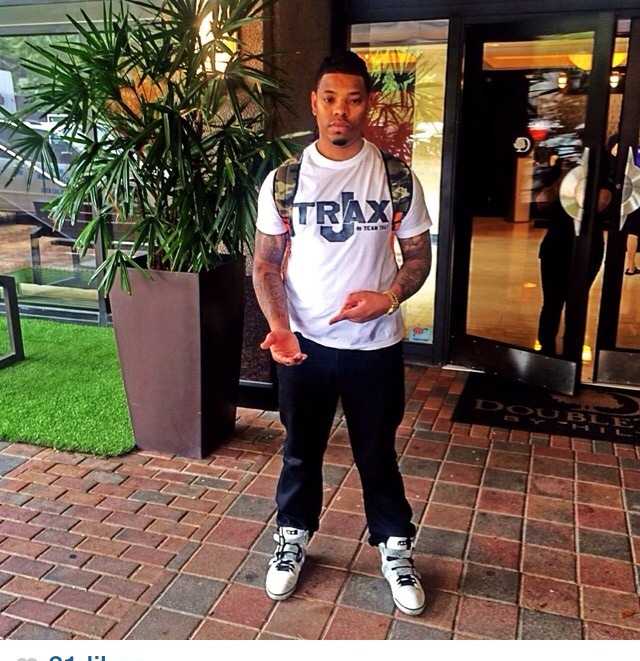 JTrax wearing a Team Trax shirt outside a hotel
