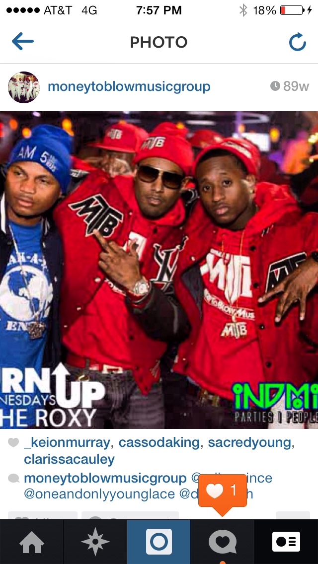 Money To Blow Music Group members in coordinated red jackets