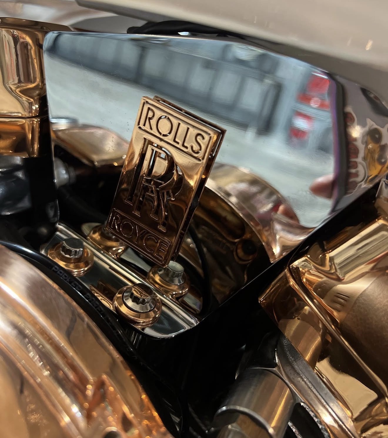 Rolls-Royce-inspired rose-gold badging